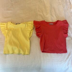 Zara coral and yellow slightly cropped tops with ruffled sleeves.